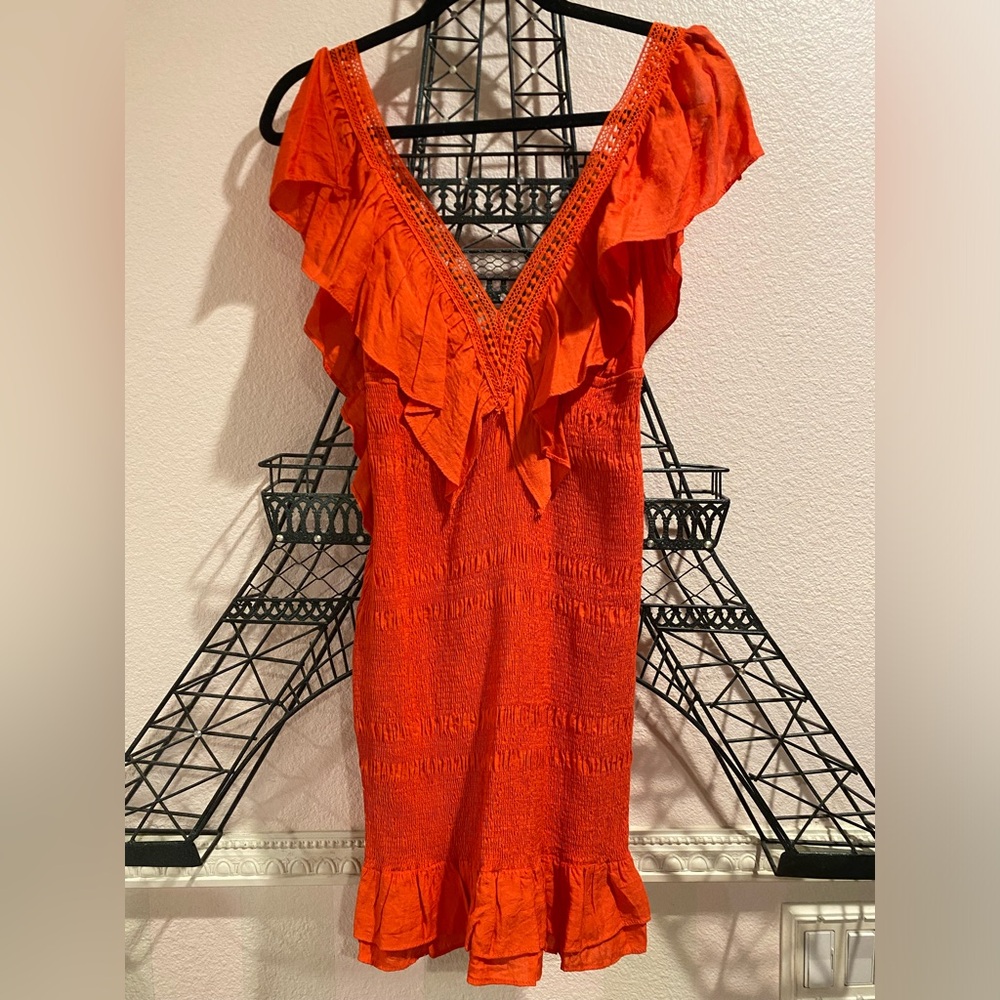 Orange ruffled body con dress